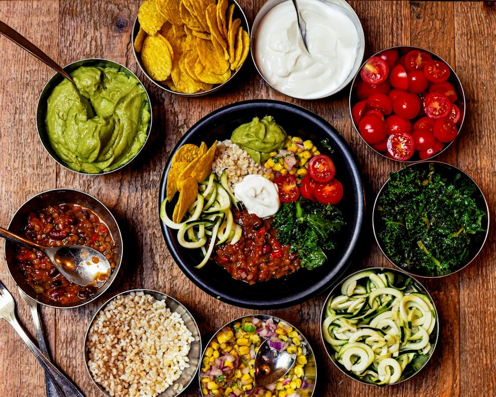 Professional kitchen setup showing fresh ingredients and cooking preparation